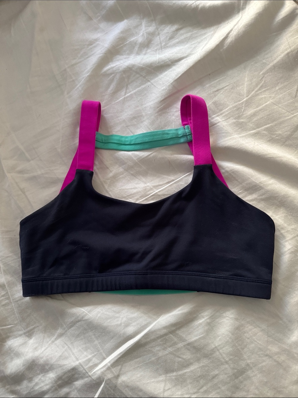 Born Primitive Black Sports Bra with Pink Straps and Teal Back Band